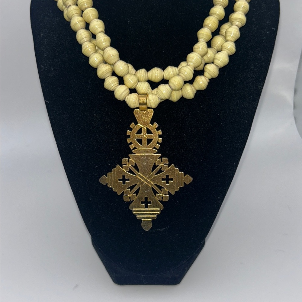 NWT Akola Cream Colored Triple Strand Cross Necklace